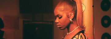 Ahluwalia in Enny's 'Charge It Remix' video